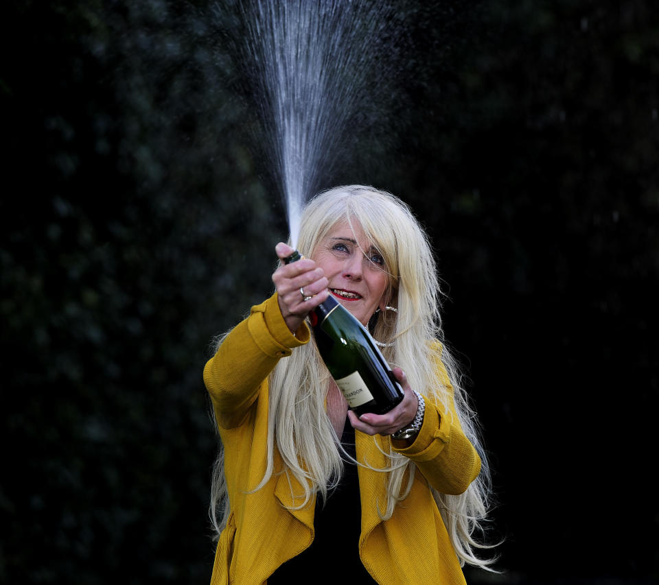 Taxi driver Melissa Ede, 57, celebrating during a photocall at Willerby Manor Hotel in Hull after her &amp;pound;4m Scratchcard win on New Year's Day.