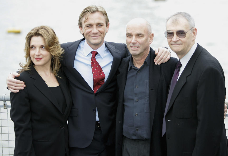 LONDON - OCTOBER 14:  Actor Daniel Craig (second left) poses with  Barbara Broccoli (far left), Martin Campbell, and Michael G Wilson (far right) as Craig is unveiled as the new actor to play the legendary British secret agent James Bond 007 in the 21st Bond film Casino Royale, at HMS President, St Katharine's Way on October 14, 2005 in London, England. Speculation as to who might replace Pierce Brosnan (who played Bond from 1995-2002) has been fierce, with Clive Owen, Jude Law, Ewan McGregor, Colin Salmon, Colin Farrell and Goran Visnjic in the running, but the most likely candidates were whittled down to Craig and Henry Cavill until today's decision.  (Photo by Chris Jackson/Getty Images)