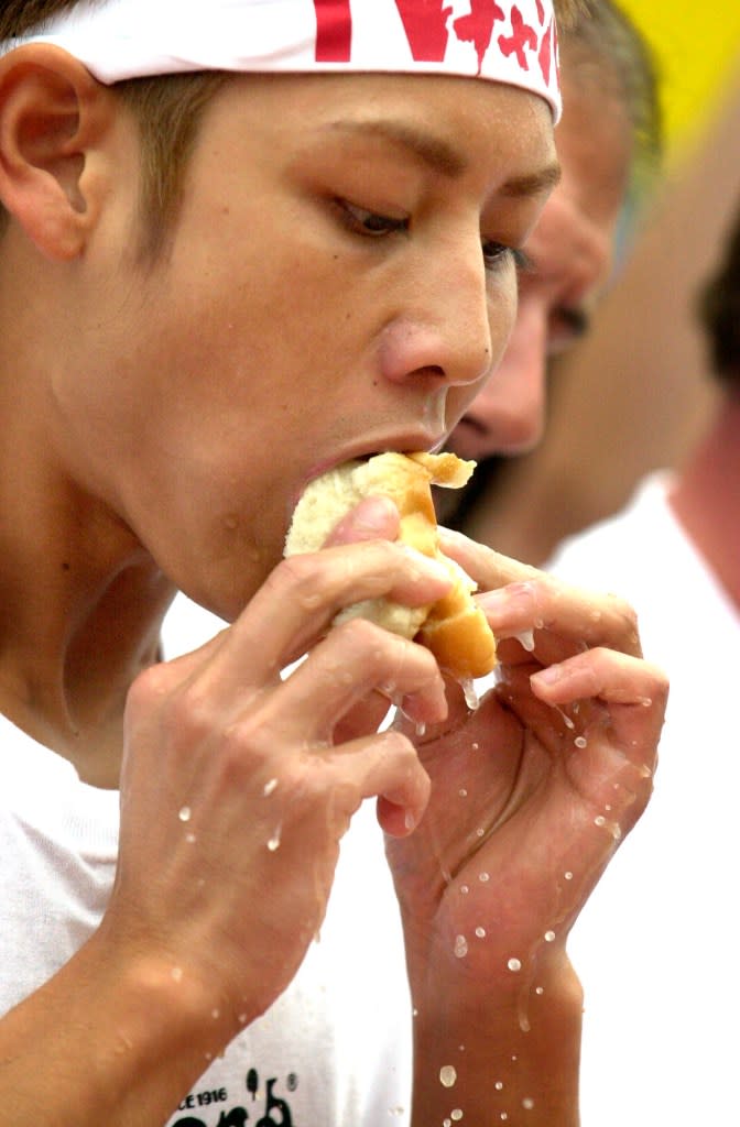 The Japanese native is pictured at the Nathan’s contest in 2001 — the first year he scored victory there. New York Post