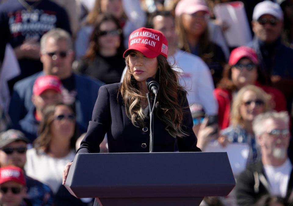 South Dakota Gov. Kristi Noem speaks ahead of former President Donald Trump during a campaign event outside Wright Bros. Aero Inc. at the Dayton International Airport for U.S. Senate candidate Bernie Moreno on Saturday, March 16, 2024 in Dayton, Ohio.