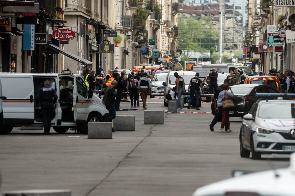 French police search for evidences in front the 'Brioche doree' after a suspected package bomb blast along a pedestrian street in the heart of Lyon, southeast France on May 24, 2019. More than a dozen people were injured in the explosion. (Photo by Nicolas Liponne/NurPhoto via Getty Images)