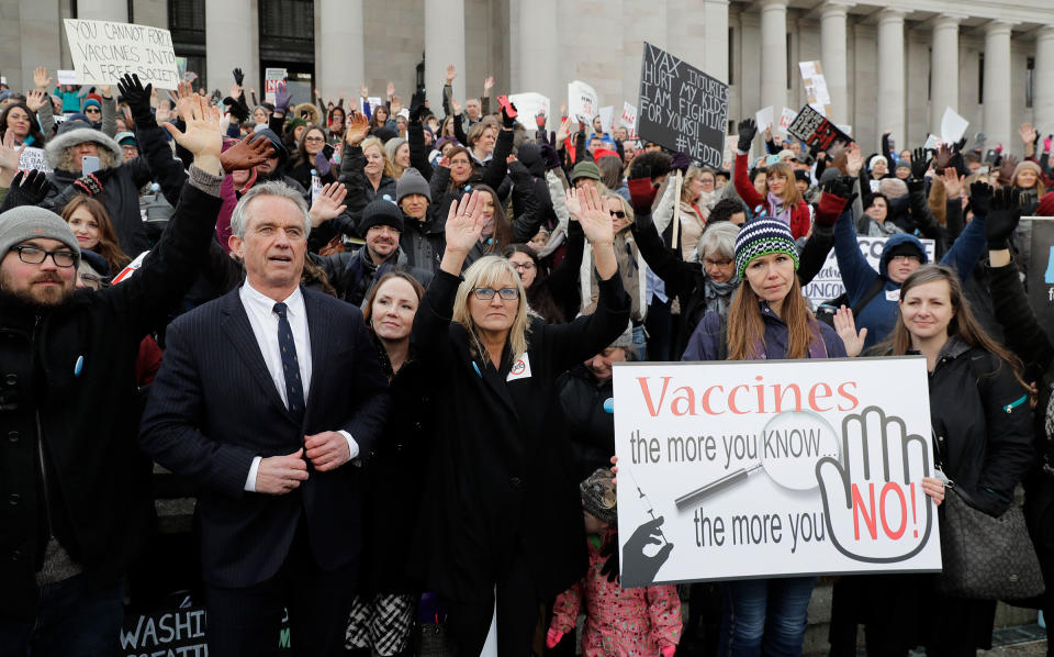 Kennedy with protesters at the Capitol in Olympia, Wash., in 2019, where they opposed a bill to tighten measles, mumps and rubella vaccine requirements for school-aged children.<span class="copyright">Ted S. Warren—AP</span>