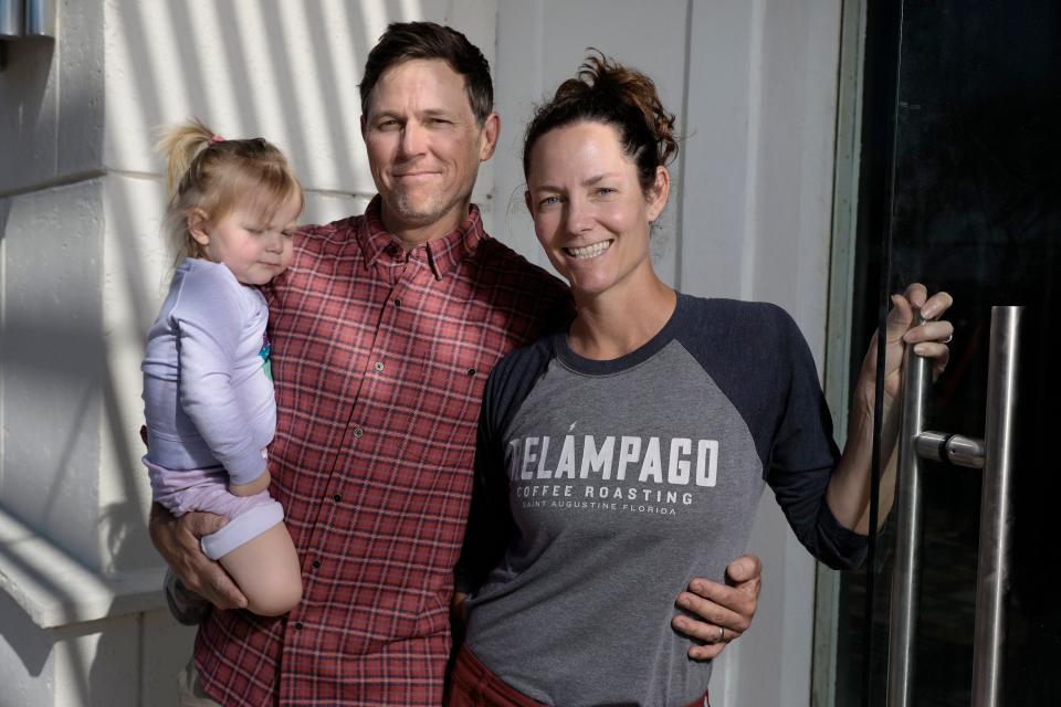 John and Julie Jacobson, co-owners of Dos Coffee & Wine in St. Augustine with their young daughter Camille, are pictured during the buildout of their soon-to-open third cafe at 4853 Big Island Drive at Town Center Plaza, adjacent to St. Johns Town Center.