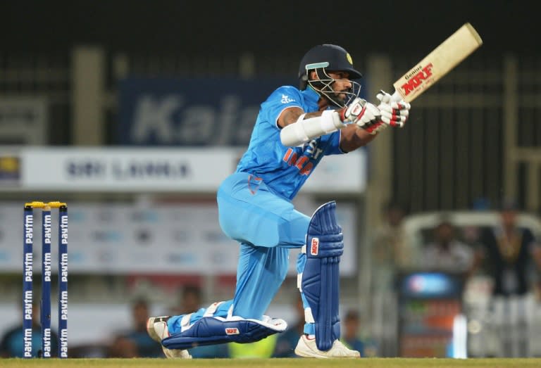 India's Shikhar Dhawan plays a shot during the second T20 international match between India and Sri Lanka at the Jharkhand State Cricket Association International Stadium Complex in Ranchi on February 12, 2016