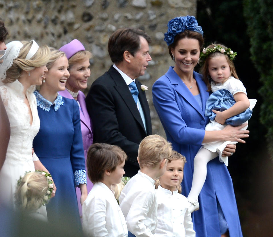 The Duchess of Cambridge happily posed alongside the rest of the bridal party. Photo: Australscope