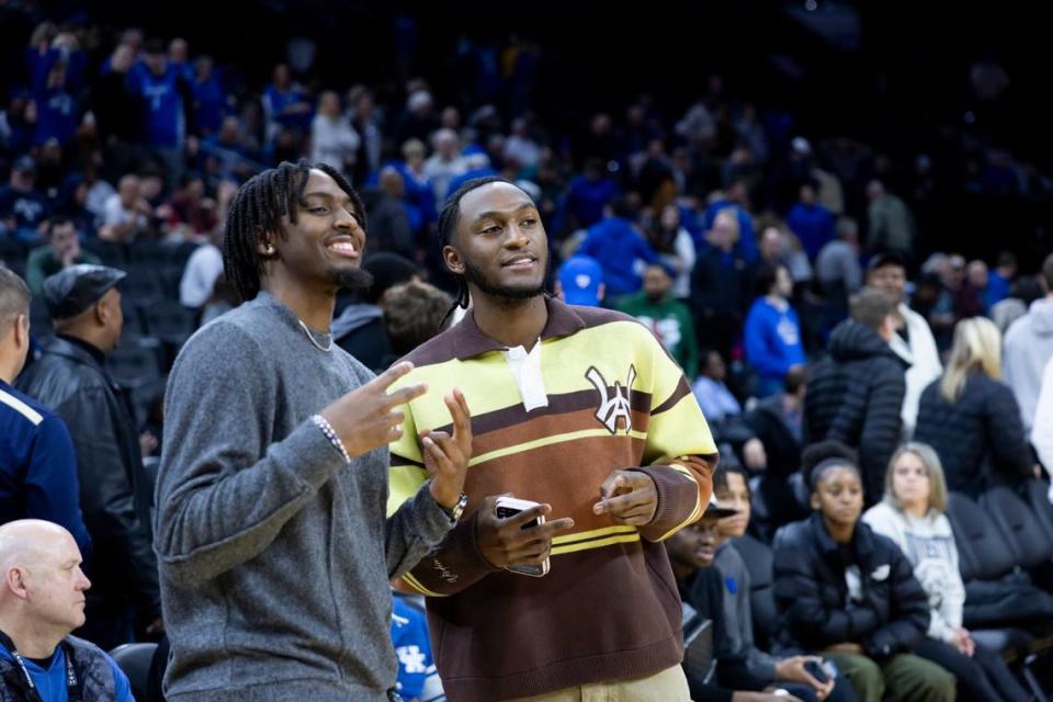 Former Kentucky stars Tyrese Maxey, left, and Immanuel Quickley attend the Wildcats’ game against Penn at the Wells Fargo Center in Philadelphia on Saturday.