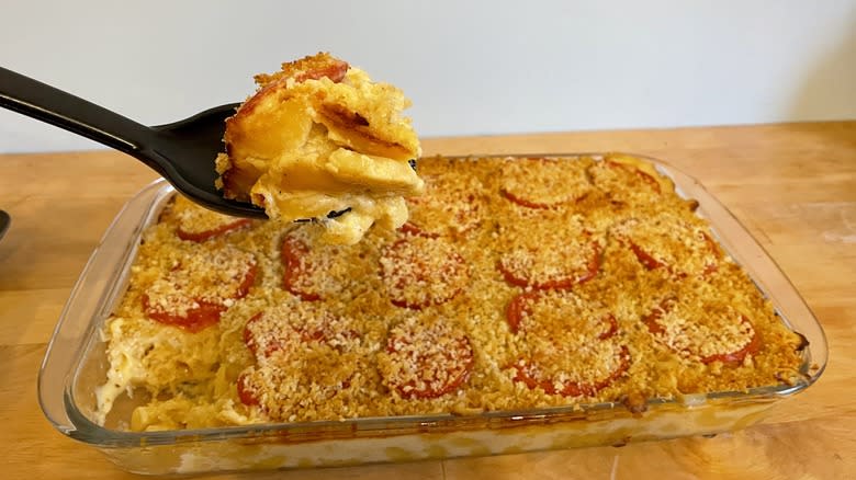 Two pans of mac and cheese ready to bake