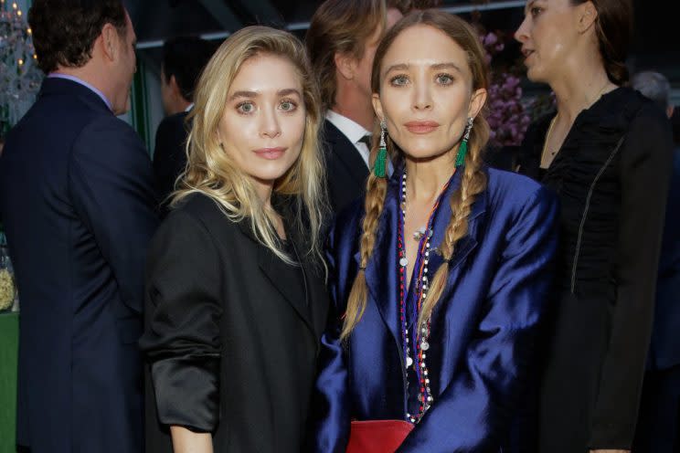 Mary-Kate Olsen, right, wears adult pigtails.