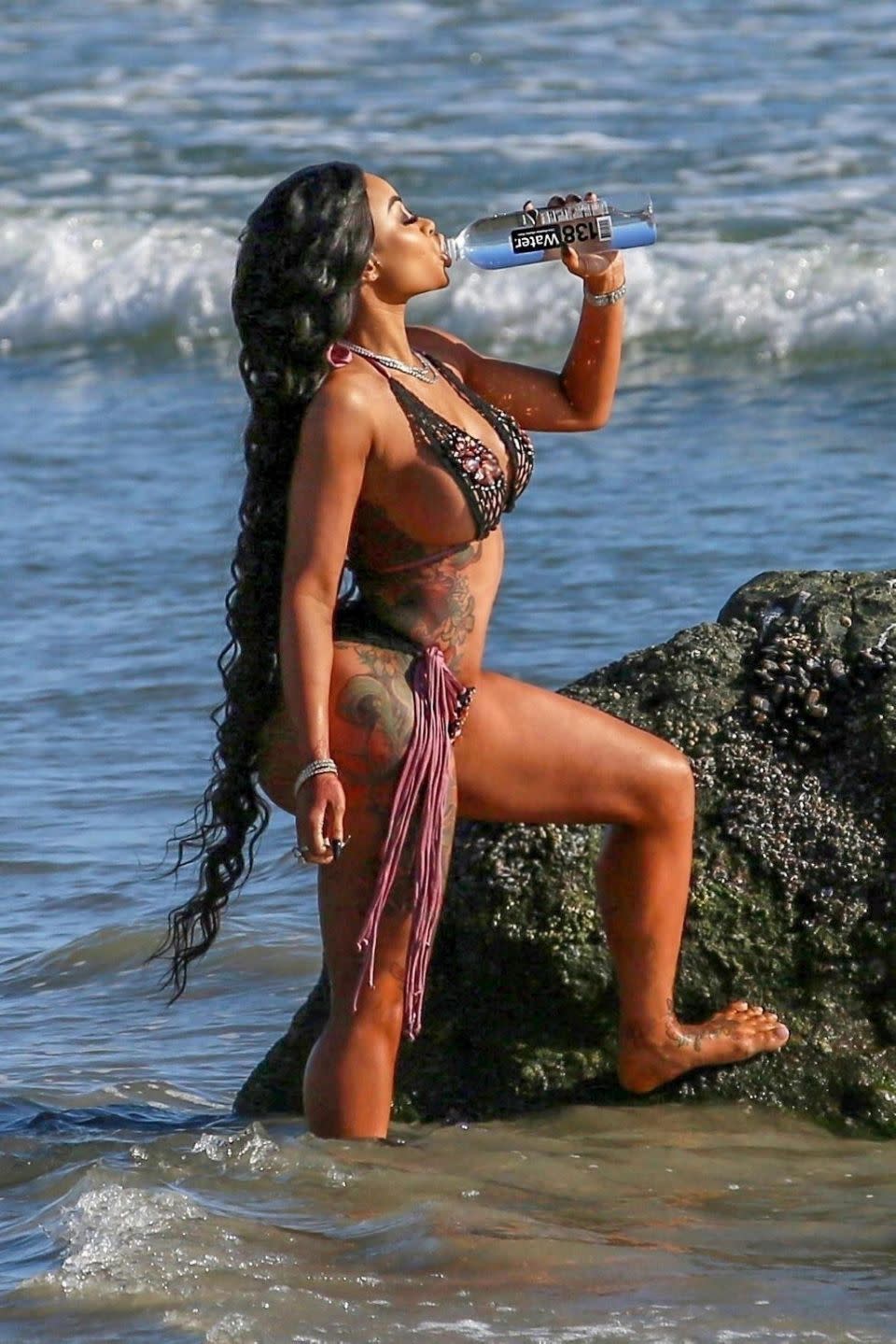 It appeared to be tiring work for Rob Kardashian's ex as she was sipping on some water the entire time. Source: Backgrid