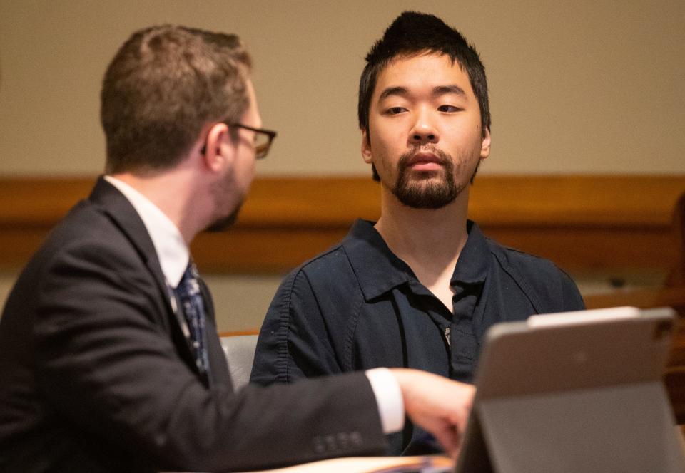 Defense attorney Kyle Cray speaks to his client Ji Min Sha during the status conference, Wednesday, Oct. 4, 2023, at the Tippecanoe County Courthouse in Lafayette, Ind.