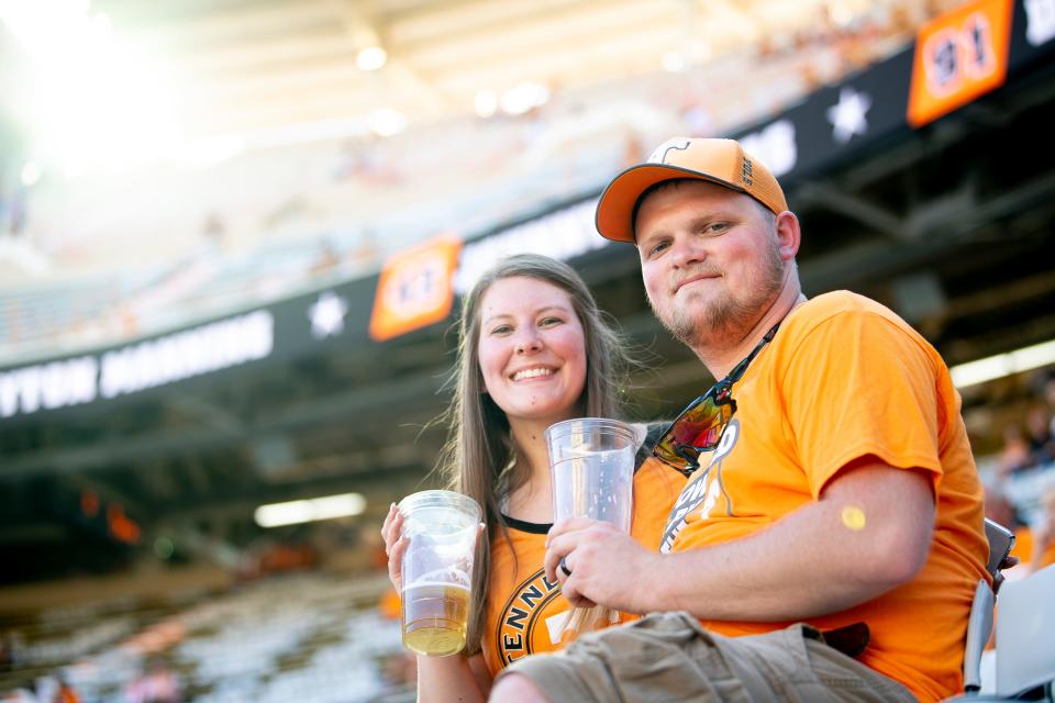 Sean and Chatney Turner, newlyweds on their honeymoon from Indiana, were one of the first people to purchase beer in Neyland Stadium during the BYU on Saturday, September 7, 2019. Saturday was the first time beer was sold at a football game since the SEC changed its alcohol policies earlier this year.