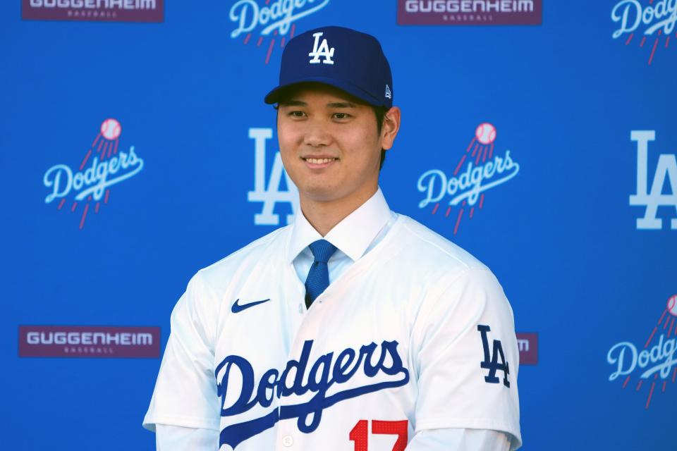 Shohei Ohtani is introduced at a press conference at Dodger Stadium.