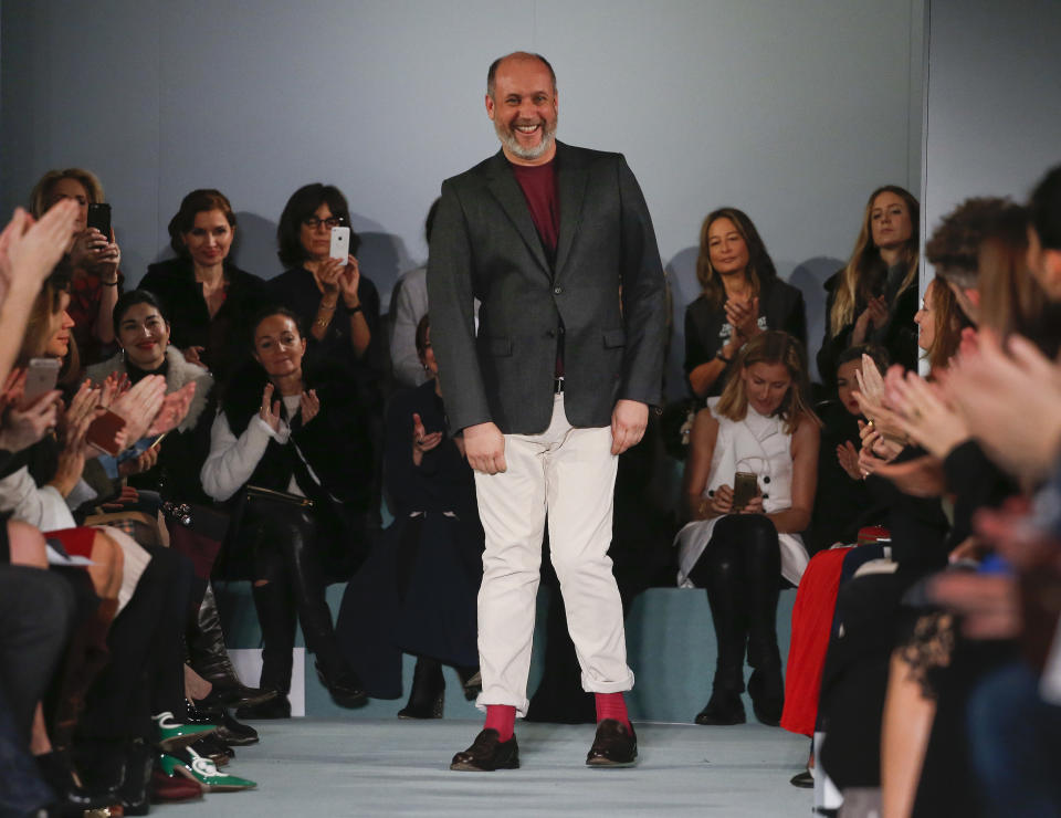 FILE - Peter Copping steps out to applause from the audience after the modeling of the Oscar de la Renta Fall 2016 collection during Fashion Week in New York, Feb. 16, 2016. Lanvin, the world's longest continually-running couture house, named Peter Copping on Thursday June27, 2024 as its new artistic director. Founded in 1889 by Jeanne Lanvin and based in Paris, Lanvin will welcome Copping as the creative head of its women's and men's collections starting in fall. (AP Photo/Julie Jacobson, File)