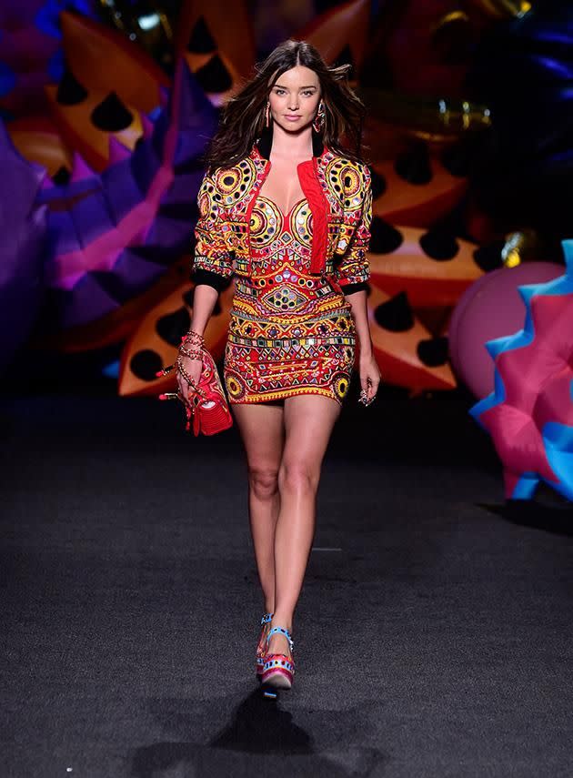 Miranda on the catwalk for Moschino. Photo: Getty Images.