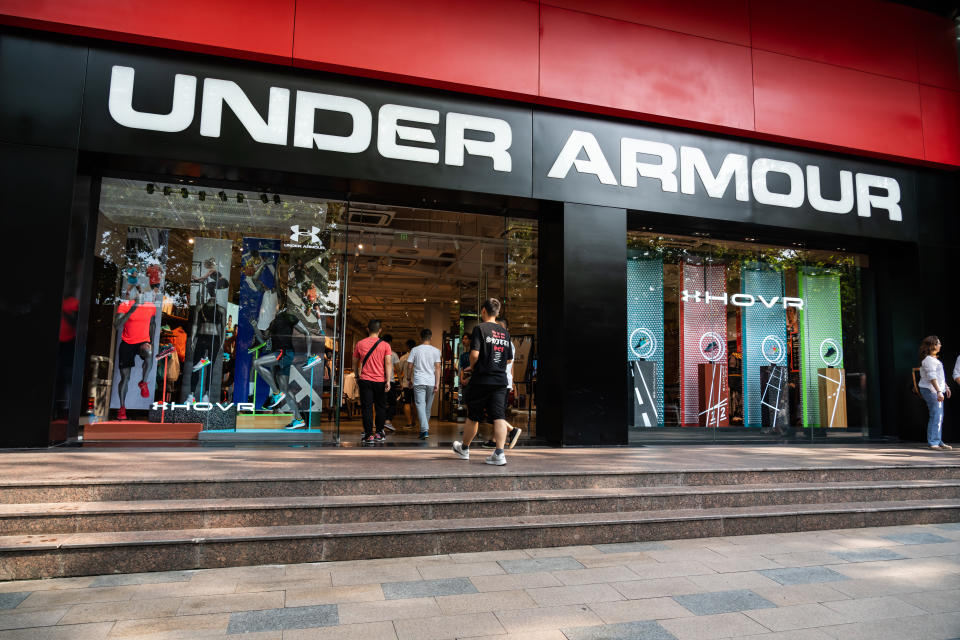 SHANGHAI, CHINA - 2019/09/07: Customers visit an American sportswear manufacturer Under Armour store in Shanghai. (Photo by Alex Tai/SOPA Images/LightRocket via Getty Images)