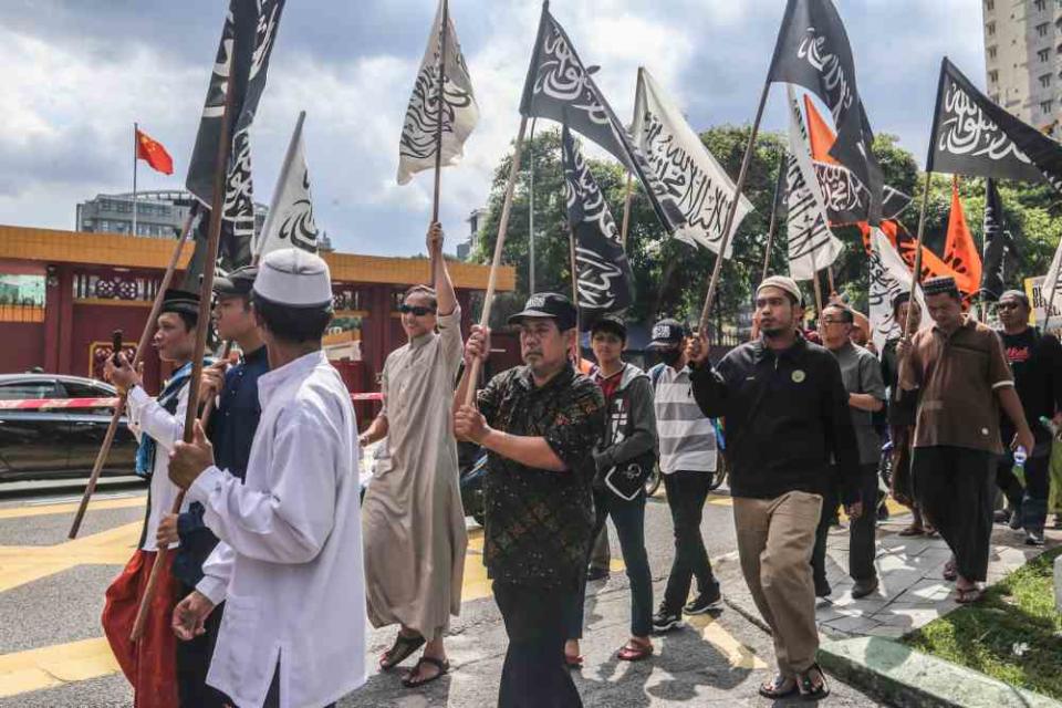 Protesters march towards the Chinese embassy in Kuala Lumpur December 27, 2019. ― Picture by Firdaus Latif