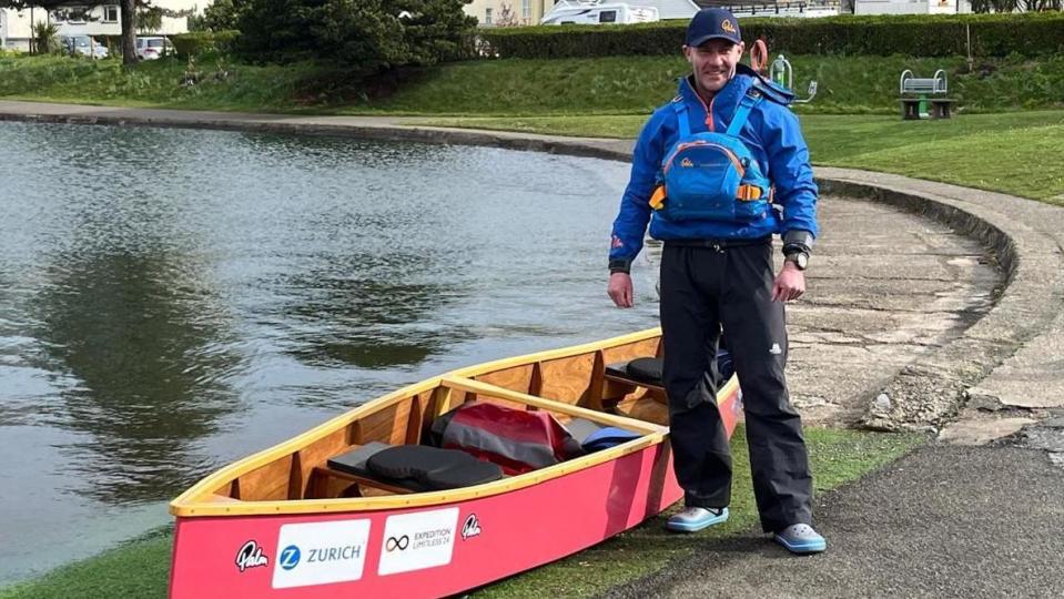 Martin Malone next to the canoe at Mooragh Park Lake