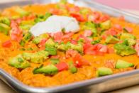 <p>This is the ultimate comfort food appetizer.</p><p>Get the recipe from <a href="https://www.delish.com/cooking/recipe-ideas/videos/a43680/party-starters-tater-tot-chos/" rel="nofollow noopener" target="_blank" data-ylk="slk:Delish;elm:context_link;itc:0;sec:content-canvas" class="link ">Delish</a>.</p>