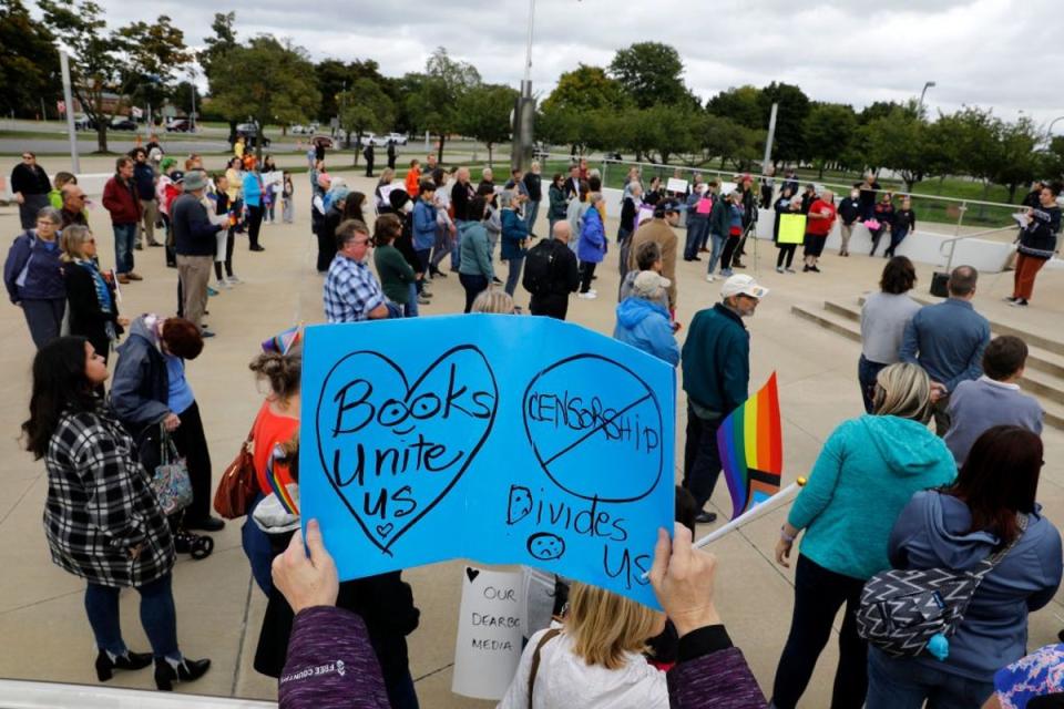 Counter-protest: Demonstrators gather to protest against banning books outside a library in Michigan in 2022 (Getty Images)