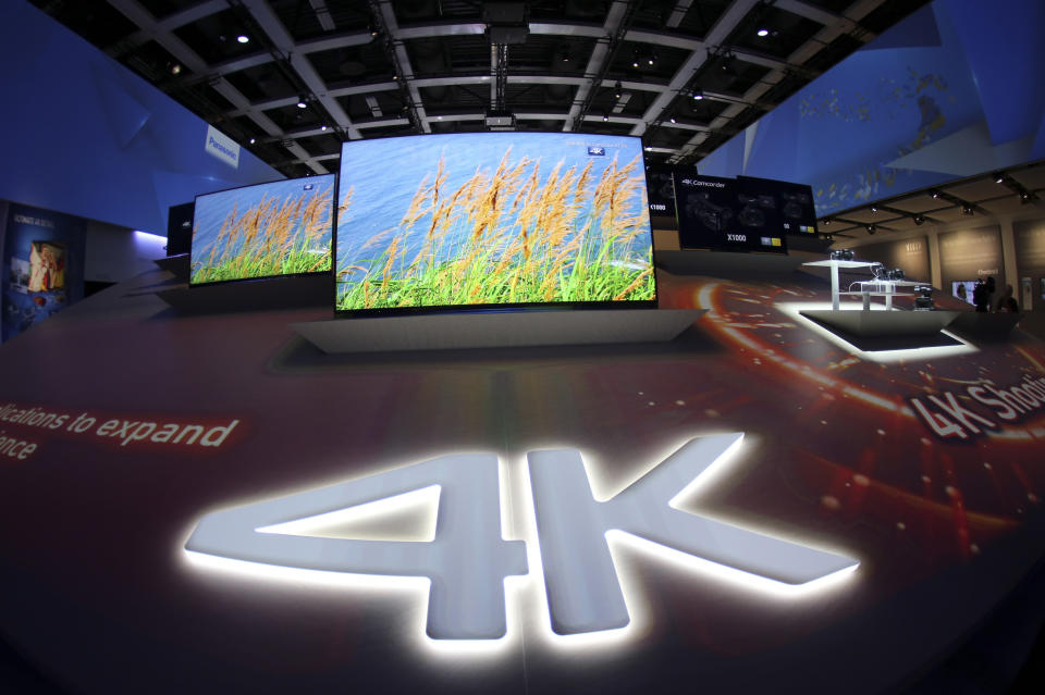 Panasonic 4K TV sets are seen on display during the IFA Electronics show in Berlin September 4, 2014. REUTERS/Hannibal Hanschke (GERMANY  - Tags: BUSINESS SCIENCE TECHNOLOGY)  