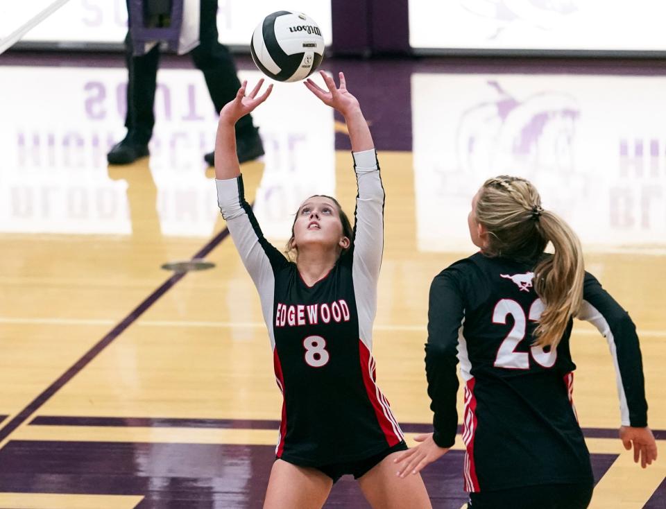 Edgewood’s Adia May (8) sets the ball for teammate Gracie Farmer (23) during the Bloomington South-Edgewood volleyball match at South Tuesday evening. (Bobby Goddin/Herald-Times)