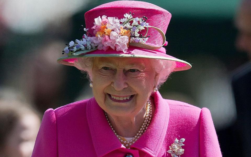 The late Queen was known for her style and eye-catching outfits - Justin Tallis/AFP via Getty Images
