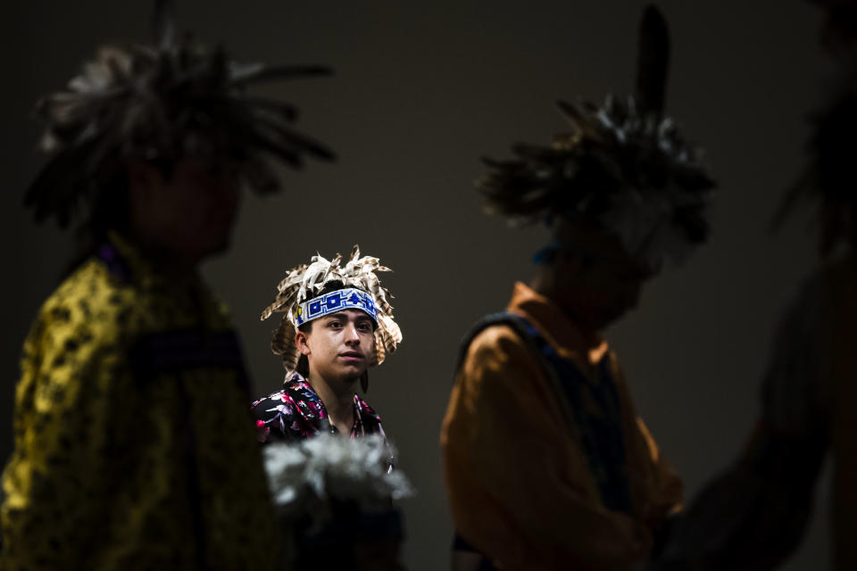 <p>Aaron Miller stands by to preform with the Longhouse Singers and Dancers representing the Oneida Nation at the Museum of the American Revolution in Philadelphia, Pa., Monday, Oct. 9, 2017. (Photo: Matt Rourke/AP) </p>