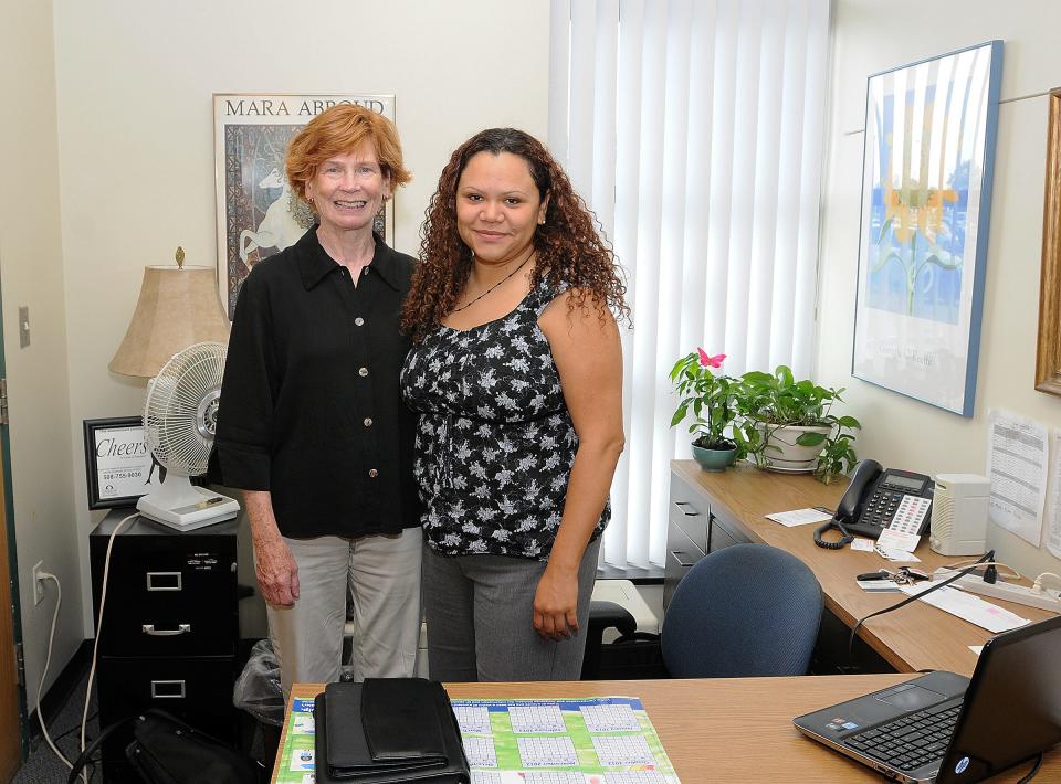 Amarely Gutierrez, right, took over for Ginger Navickas, left, when she retired from the YWCA in 2012, after 40 years.