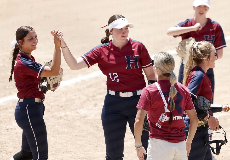 Herriman High School celebrates a run in the 6A semifinal game against Skyridge High School at the Cottonwood Complex in Murray on Wednesday, May 24, 2023. | Laura Seitz, Deseret News