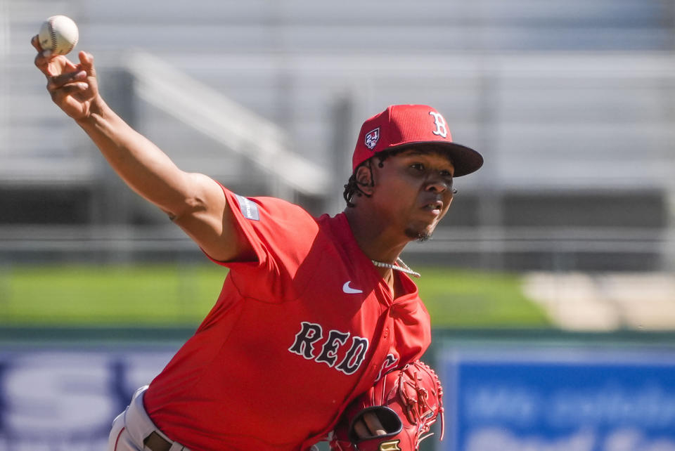 Red Sox pitcher Brayan Bello works out during spring training in Fort Myers, Fla., Thursday, Feb. 15, 2024. (AP Photo/Gerald Herbert)