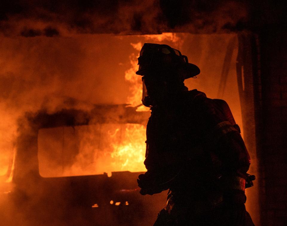 Firefighters put out a fire at a house Thursday, Dec. 22, 2022 on the corner of Clemson Street and Albright Court.