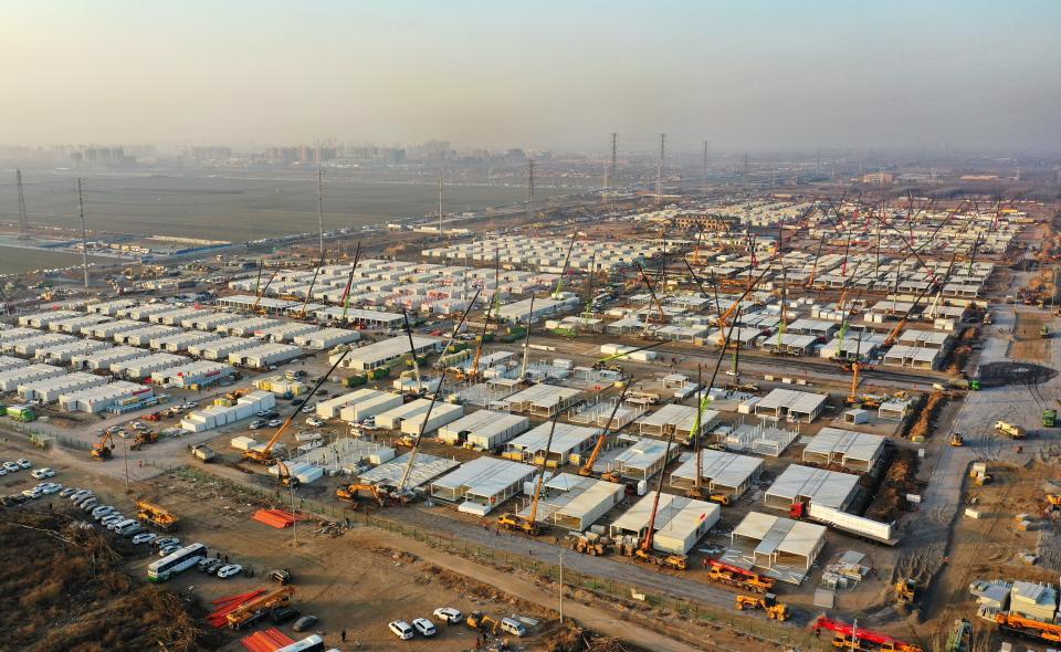 SHIJIAZHUANG, Jan. 18, 2021 -- Aerial photo taken on Jan. 18, 2021 shows the Huangzhuang apartment COVID-19 quarantine center under construction in Shijiazhuang, north China's Hebei Province.   Construction of the main structures of the Huangzhuang apartment COVID-19 quarantine center in Shijiazhuang is nearing the end. With a total floor area of 34 hectares, the facility will house close contacts or secondary close contacts of COVID-19 confirmed cases. (Photo by Yang Shiyao/Xinhua via Getty) (Xinhua/Yang Shiyao via Getty Images)