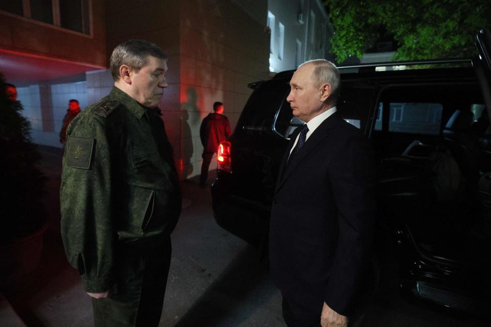 Russia's President Vladimir Putin, accompanied by Army chief of staff Valery Gerasimov, visits the military headquarters in Rostov-on-Don on Thursday (POOL/AFP via Getty Images)