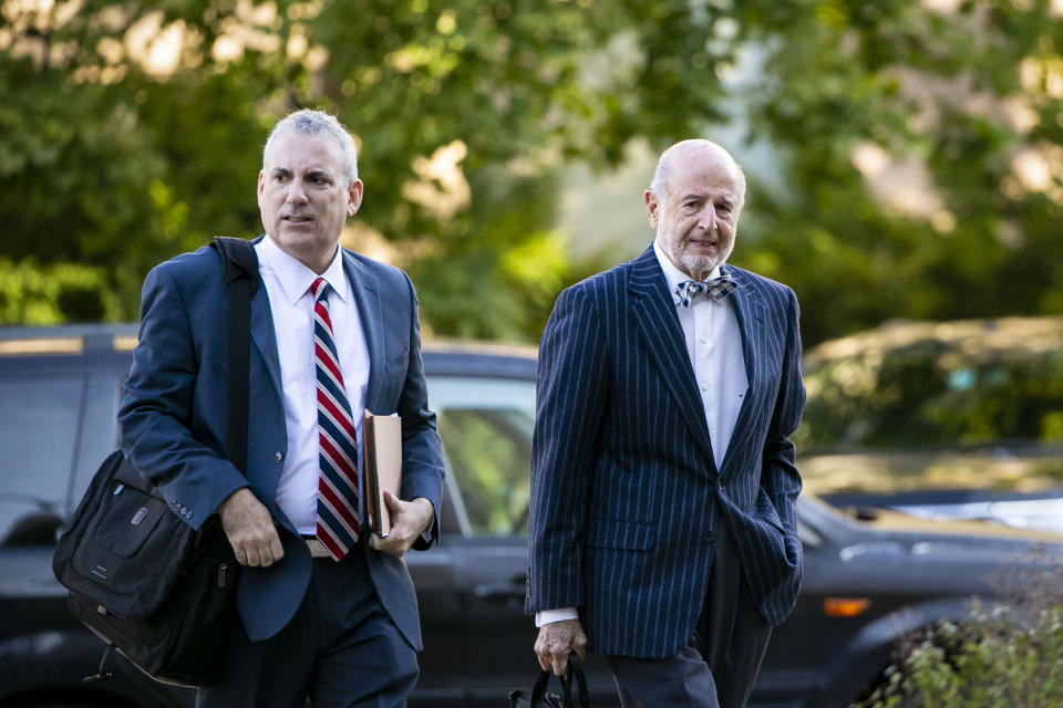 Bruce Rogow, attorney for Roger Stone, right, arrives at Federal Court for his federal trial in Washington, Friday, Nov. 8, 2019. (AP Photo/Al Drago)