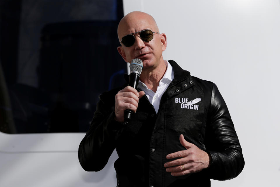Amazon and Blue Origin founder Jeff Bezos addresses the media about the New Shepard rocket booster and Crew Capsule mockup at the 33rd Space Symposium in Colorado Springs, Colorado, United States April 5, 2017.  REUTERS/Isaiah J. Downing