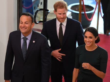 Britain's Prince Harry and his wife Meghan, the Duke and Duchess of Sussex, are greeted by the Taoiseach Leo Varadkar, as they arrive for a two-day visit to Dublin, Ireland July 10, 2018. REUTERS/Clodagh Kilcoyne