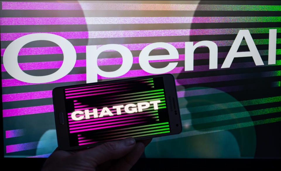 OpenAI logo seen on screen with ChatGPT website displayed on mobile seen in this illustration, on January 8, 2023 in Brussels, Belgium. (Photo illustration by Jonathan Raa/NurPhoto via Getty Images)