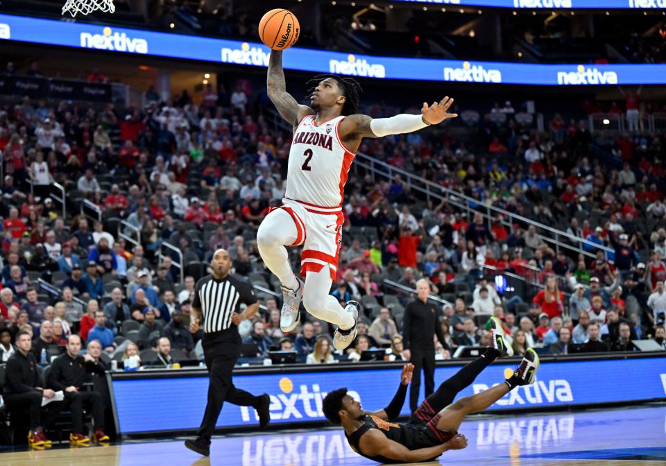 Caleb Love #2 of the Arizona Wildcats goes to the net against the Arizona Wildcats in the first half of a quarterfinal game of the Pac-12 Conference basketball tournament at T-Mobile Arena on March 14, 2024, in Las Vegas, Nevada.