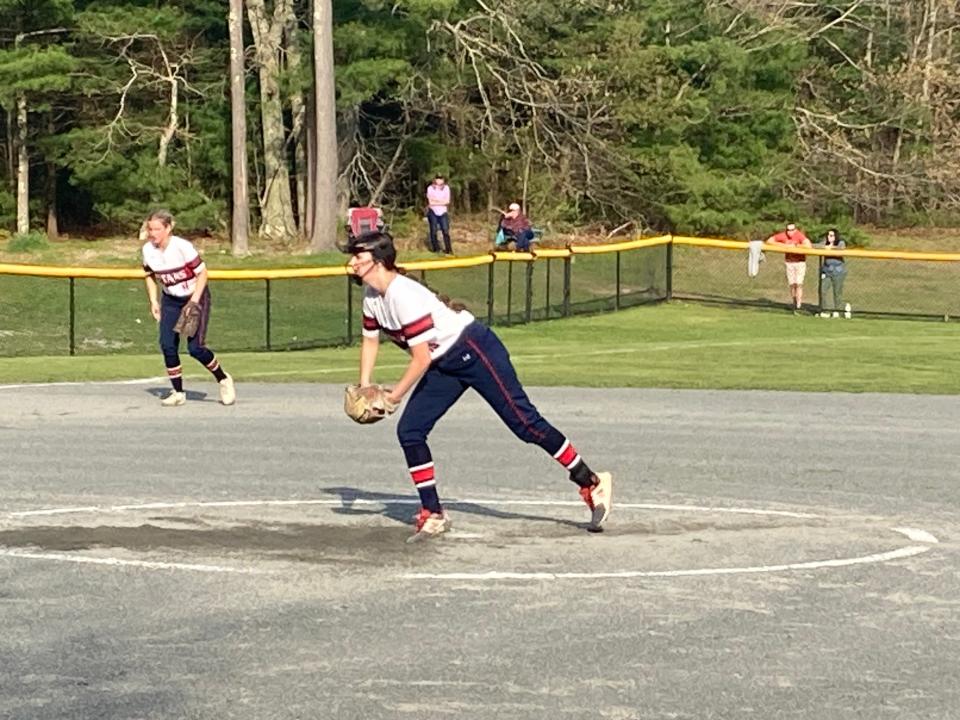 Pembroke senior pitcher Kelly McGee gets ready to go into her windup during a 6-0 win over Falmouth on Monday, May 6, 2024. McGee threw a 2-hit shutout with 11 strikeouts in a 6-0 victory that clinched a Div. 3 playoff spot for the Titans (10-3).