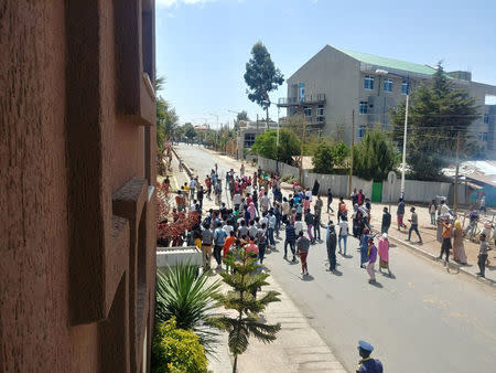 Demonstrators walk along a street in Asella, Oromiya Province, Ethiopia February 13, 2018. Mandatory Credit. TWITTER/@WAGUWAGU91 via REUTERS