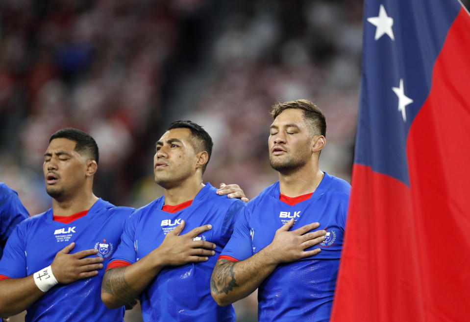 Samoan players sing their national anthem prior to the start of their Rugby World Cup Pool A game at City of Toyota Stadium between Japan and Samoa in Tokyo City, Japan, Saturday, Oct. 5, 2019. (AP Photo/Shuji Kajiyama)