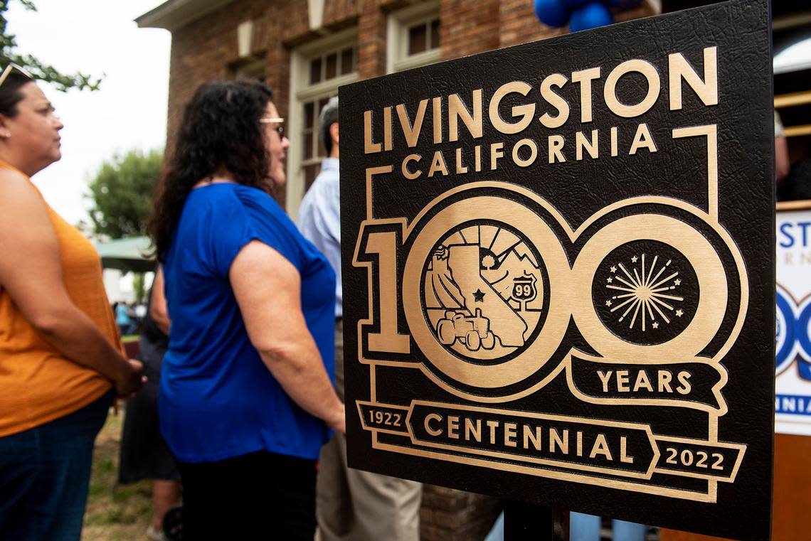 A centennial plaque is on display as people line up to enter the Livingston Historical Museum during the City of Livingston’s centennial celebration in Livingston, Calif., on Sunday, Sept. 11, 2022.