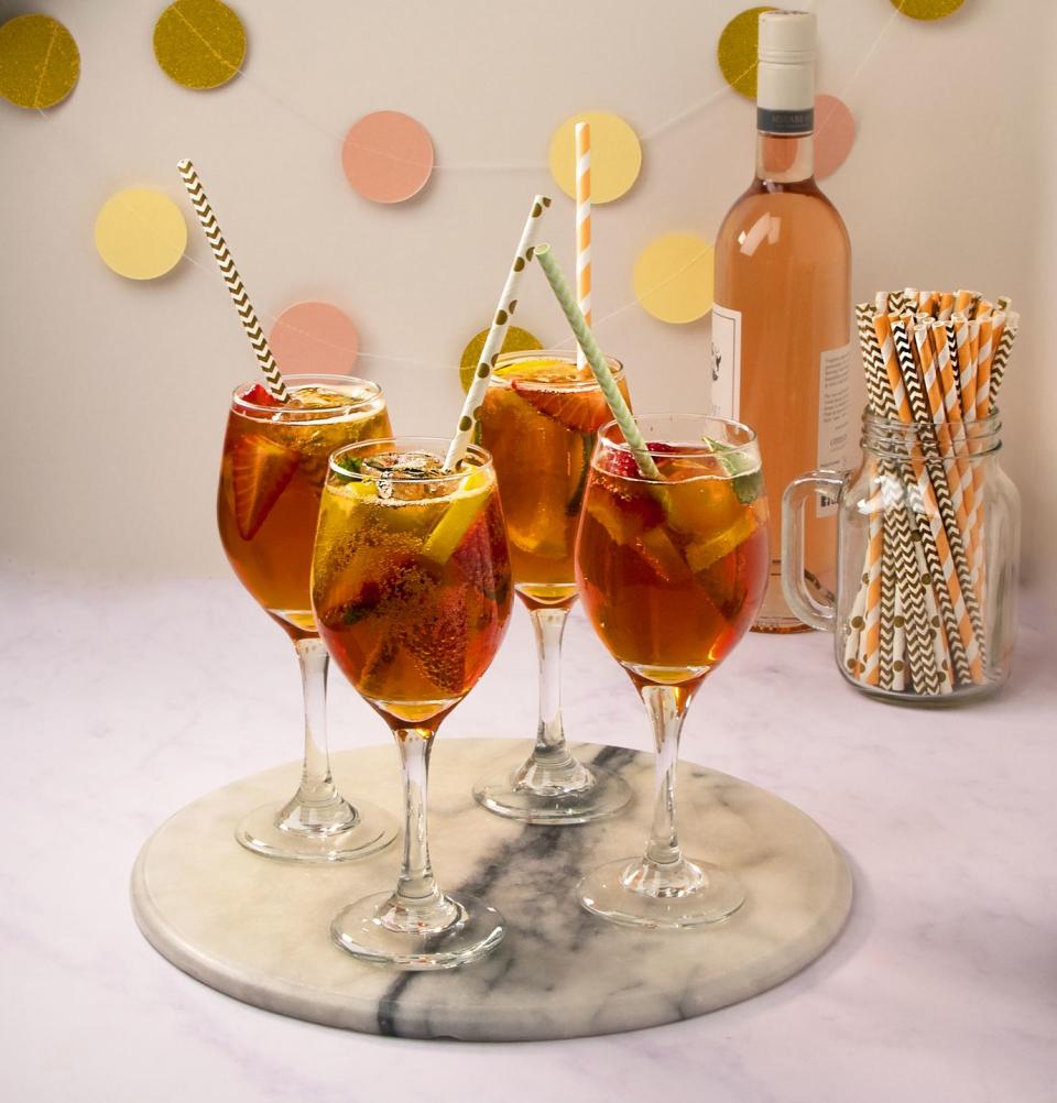 <p>We've added a fruity sparkling rose wine to the traditional summer drink. </p><p><strong>Recipe: <a href="https://www.goodhousekeeping.com/uk/food/recipes/a27253177/pink-pimms/" rel="nofollow noopener" target="_blank" data-ylk="slk:Pink Pimm's cocktail;elm:context_link;itc:0;sec:content-canvas" class="link ">Pink Pimm's cocktail</a></strong></p>