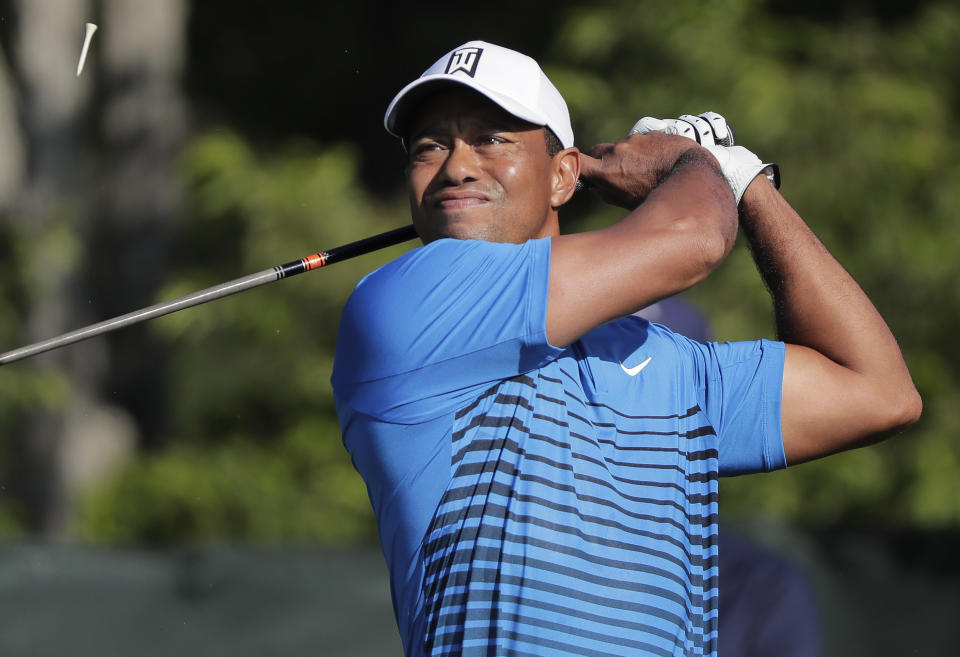 Tiger Woods tees off the fourth hole during a practice round for the U.S. Open Golf Championship, Tuesday, June 12, 2018, in Southampton, N.Y. (AP)