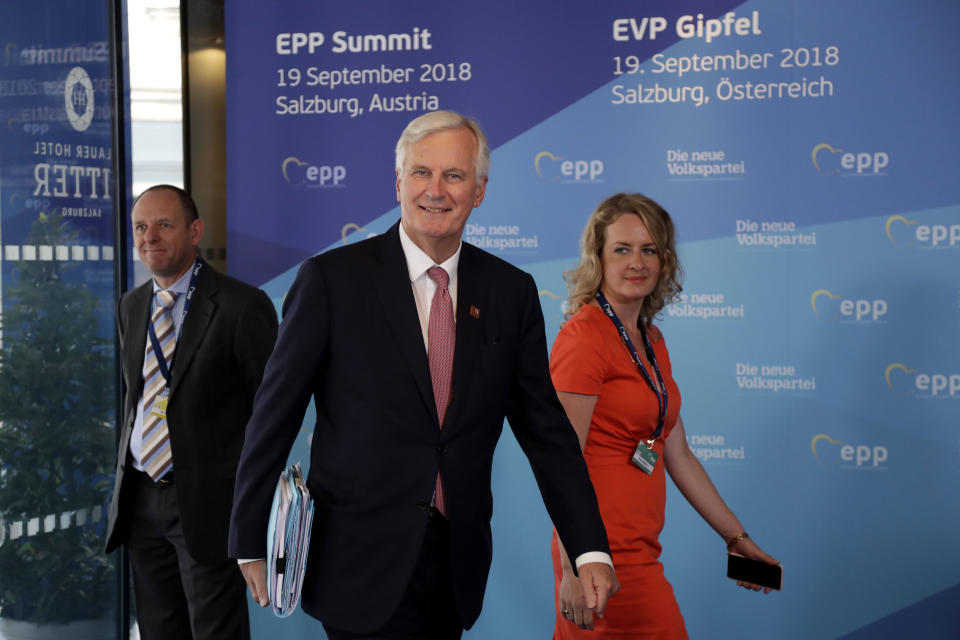 EU chief Brexit negotiator Michel Barnier, center, arrives at the informal EU summit in Salzburg, Austria, Wednesday, Sept. 19, 2018. (AP Photo/Matthias Schrader)