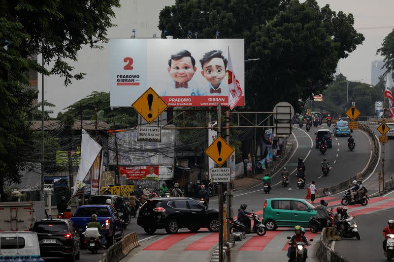 A billboard promoting Indonesia's Defence Minister and Presidential candidate Prabowo Subianto and his running mate Gibran Rakabuming Raka in Jakarta