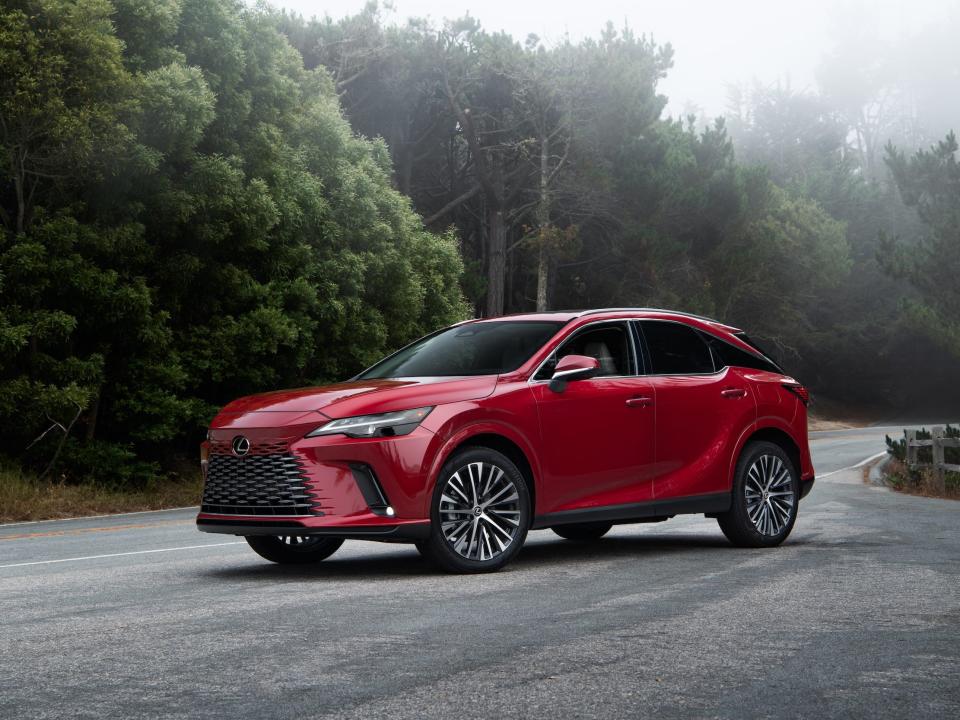 A red Lexus RX 350h SUV.