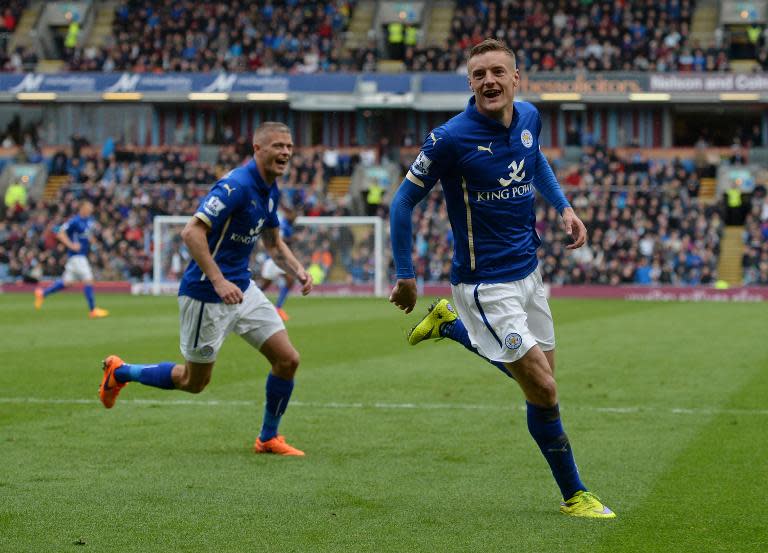 Leicester City's striker Jamie Vardy (R) celebrates his goal during the English Premier League football match between Burnley and Leicester on April 25, 2015