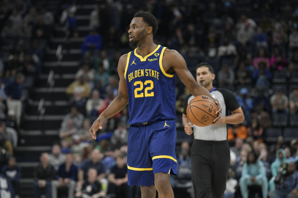 Golden State Warriors forward Andrew Wiggins (22) plays in the second half of an NBA basketball game against the Memphis Grizzlies Friday, Feb. 2, 2024, in Memphis, Tenn. (AP Photo/Brandon Dill)