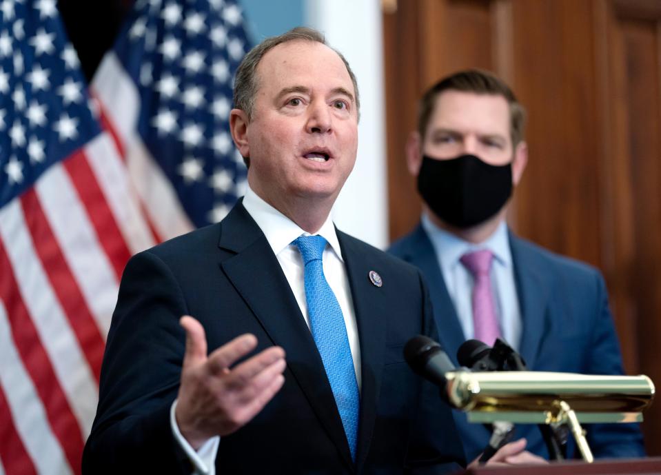 FILE - House Intelligence Committee Chairman Adam Schiff, D-Calif., left, joined by Rep. Eric Swalwell, D-Calif., speaks to reporters at a news conference at the Capitol in Washington, Feb. 23, 2022. (AP Photo/J. Scott Applewhite, File)